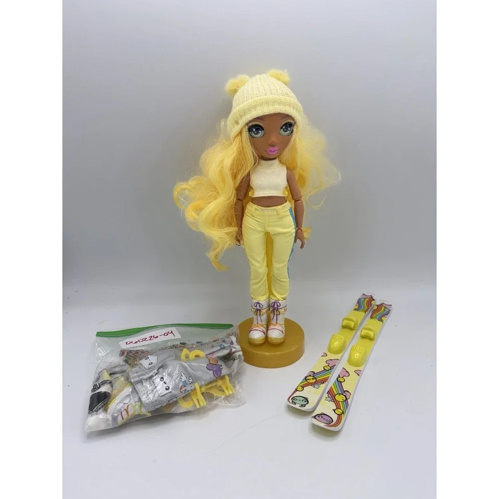 Rainbow High Winter Break Sunny Madison Yellow Fashion Doll Complete with Skis